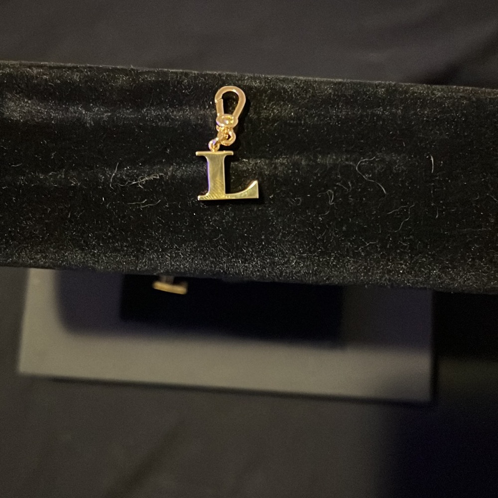 Coach “L” charm